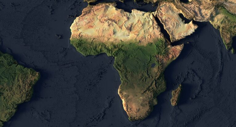 A 3D world map used in a classroom setting as an educational tool for geography lessons.