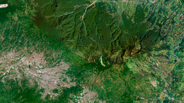 Decorative piece featuring a satellite map of Costa Rica’s natural landscapes.