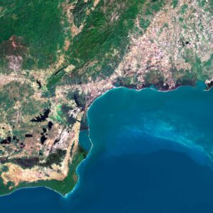 Satellite view of Cuba highlighting coastal areas and inland regions.