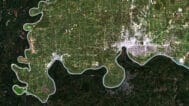 Decorative piece featuring a satellite view of indiana’s natural and urban landscapes.