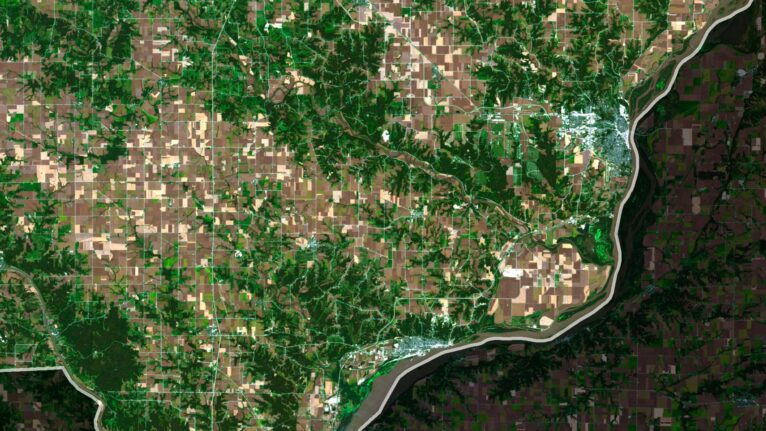 Decorative piece featuring a satellite view of Iowa’s natural landscapes, perfect for framing.