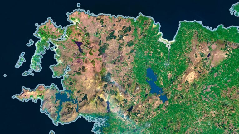 Satellite view of Ireland highlighting rolling hills and rugged coastlines.