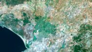 Decorative piece featuring a satellite map of Spain’s natural landscapes.