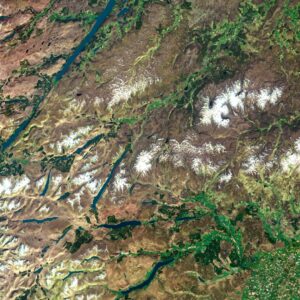 Satellite view of the United Kingdom highlighting urban centers and rural countryside.