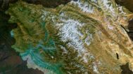 Satellite view of India highlighting the Himalayas and coastal plains.